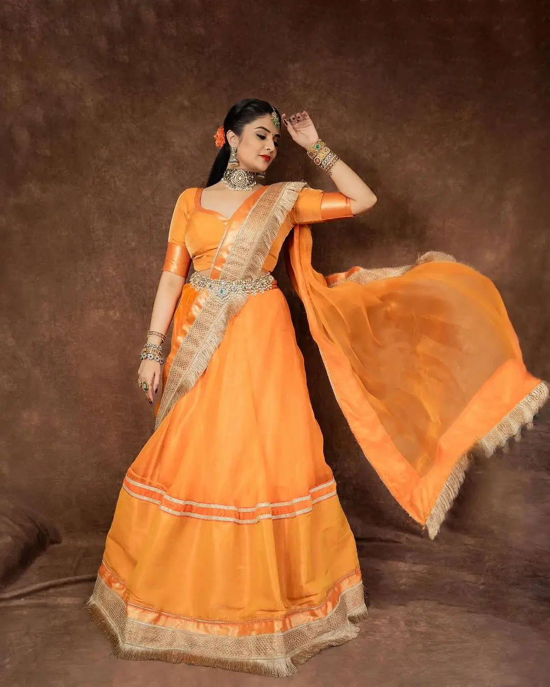 ETV Actress Sreemukhi in Orange Lehenga Blue Choli